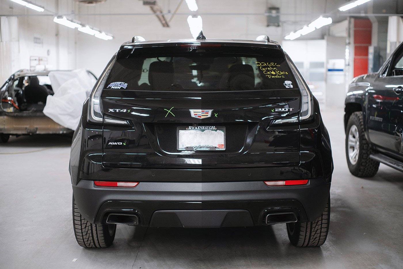 Rear view of a dented car after an accident